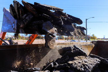 Obraz premium Construction crew removes old concrete in work zone while preparing for new pavement