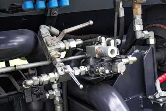 Hydraulic machinery manifold with pipes and valves