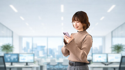 スマートフォンを見るビジネスウーマン オフィスで連絡や確認をする女性のビジネスイメージ, Businesswoman Looking at Smartphone in Office Communication Concept © Trickster*