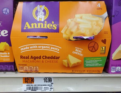 Wilmington, Delaware, U.S - March 3, 2026 - Annie' organic macaroni and cheese cups displayed with product highlights, vibrant design and pricing