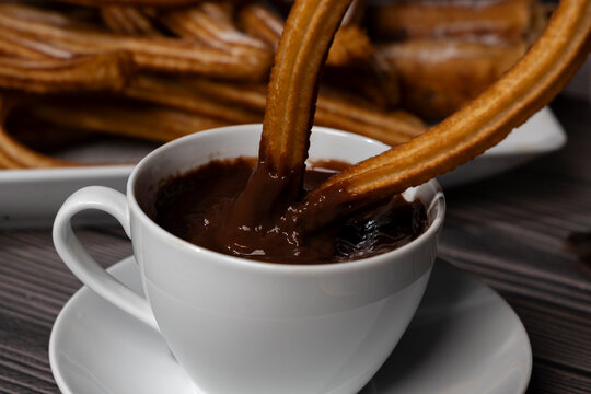 Close up food photography of churros and hot chocolate