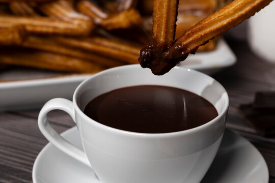 Spanish dessert churros with chocolate dipping sauce