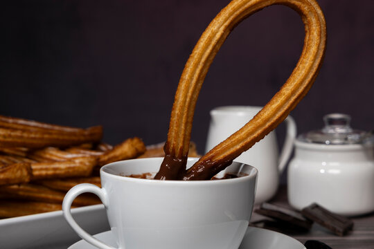 Traditional churros and chocolate Spanish sweet snack