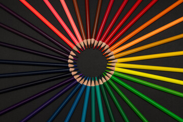 Colorful Pencils Arranged in Circle on Black Background &ndash; Creative Spectrum Concept