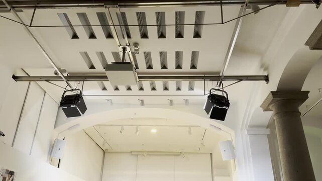 venue ceiling with acoustic installations and projector