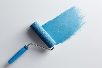 Blue paint roller creating a cyan stroke on a white textured surface with fresh pigment and smooth even coverage ideal for wall coating and color sample swatch