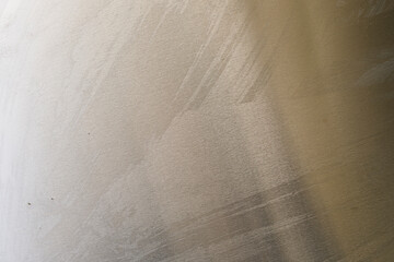 Obraz premium Textured golden background with subtle brushstrokes, perfect for design and digital projects. Use as a background, textu