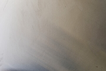 Obraz premium Abstract background featuring a subtle gradient on a textured metallic surface, ideal for design templates and digital u
