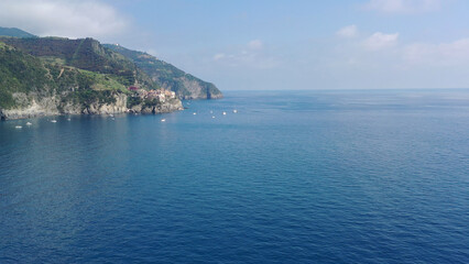 Fototapeta premium View of the Cinque Terre with a beautiful, clear sea. Italy 