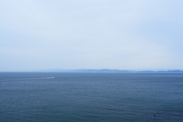 兵庫県洲本温泉から眺める紀淡海峡と遠くに望む友ヶ島【3月】