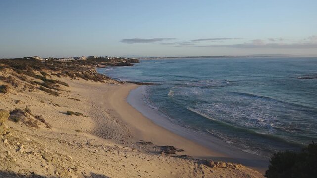 4k 60p footage of the Iconic Arniston coastline with its turquoise waters and beautiful village homes in the background. Serene remote beach in Overberg, Western Cape, South Africa.