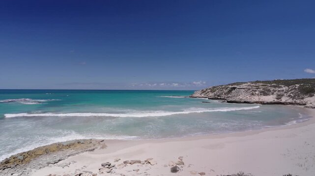 4k 60p footage of stunning golden sands meeting turquoise waters along Arniston&rsquo;s beautiful Overberg coastline, Western Cape, South Africa. Iconic, remote beach serenity.