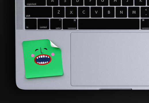 Square Sticker Mockup on Laptop Keyboard