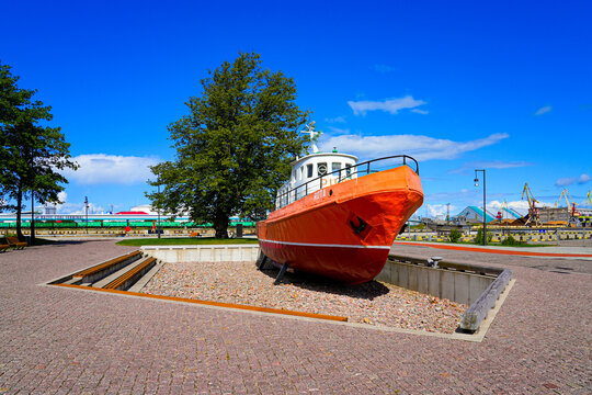 Retired pilot boat "Rota" displayed on the Ostas Street Promenade in Ventspils, Latvia - Maritime exhibit on the shores of the Venta River near the Baltic Sea