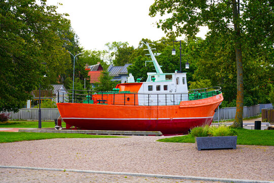 Retired pilot boat "Rota" displayed on the Ostas Street Promenade in Ventspils, Latvia - Maritime exhibit on the shores of the Venta River near the Baltic Sea