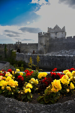 Bunratty Castle in County Clare Ireland with Colorful Garden Flowers
