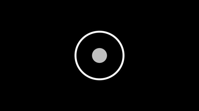 A bright cyan concentric circle with a solid cyan dot in the center against a deep black background symbolizing a target or a focal point in technology or innovation
