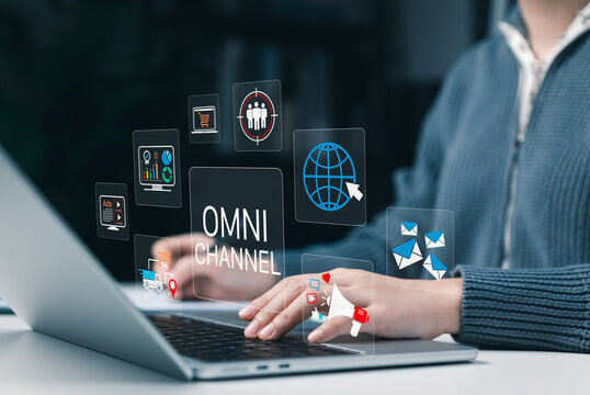 Omnichannel marketing concept. Digital customer engagement and communication channels. Woman using laptop to manage online marketing, analytics, email campaigns, ecommerce, customer targeting strategy
