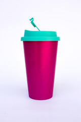 A pink metallic coffee cup with a tosca lid, isolated on white background.