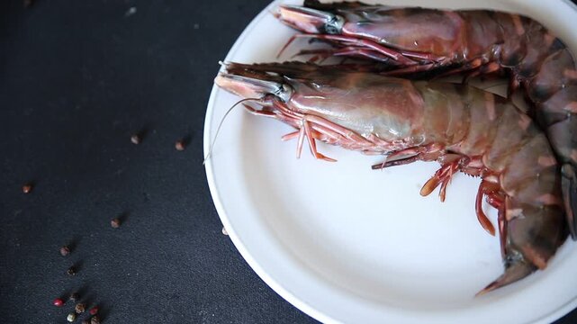 Tiger prawn raw king gambas shrimp seafood natural food ingredient appetizer fresh tasty gourmet on the table rustic top view copy space food background pescetarian diet