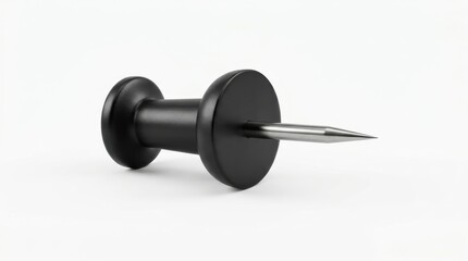 Close-up of a sleek black piercing stud with a sharp silver needle on a plain white background
