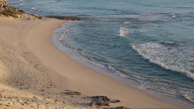 4k 60p footage of stunning golden sands meeting turquoise waters along Arniston&rsquo;s beautiful Overberg coastline, Western Cape, South Africa. Iconic, remote beach serenity.