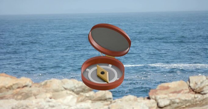 Orange compass hovering over rocks rotating flipping open revealing yellow needle for navigation