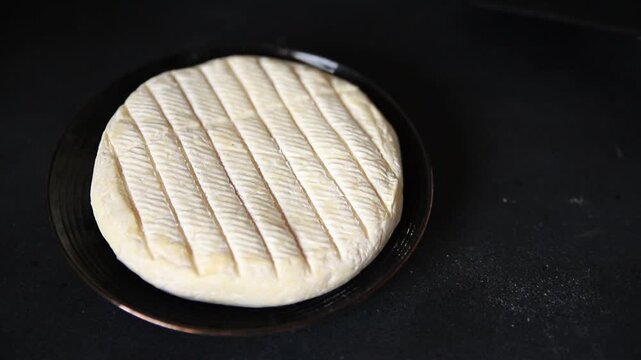 Soft cheese Camembert, Brie or Coulommiers cheese head tasty snack fresh gourmet food background on the table rustic food top view copy space marketing concept photo