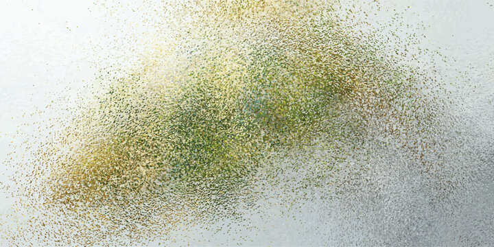 Close-up of green and yellow mold spores on a white surface.