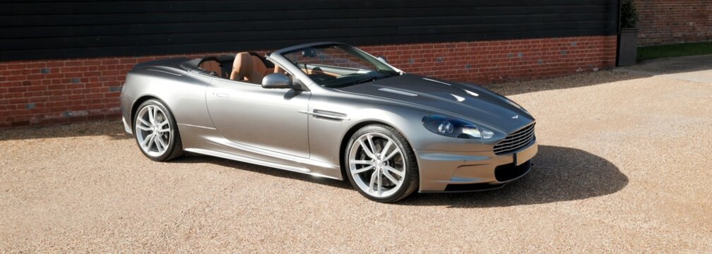 2011 Aston Martin DBS Volante, Luxury Car. classic car on the road