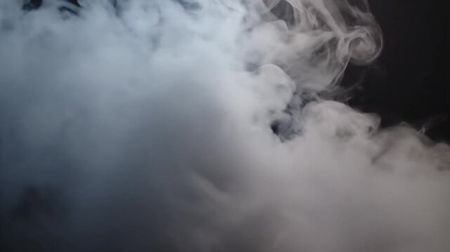 Smoke swirling in dark background.