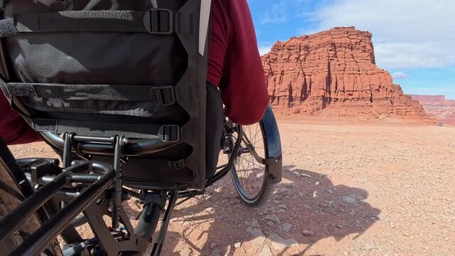POV from a slow recumbent tricycle off road ride at Thelma and Louise Point overlooking Colorado River canyon near Moab, Utah