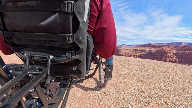 POV from a slow recumbent tricycle off road ride at Thelma and Louise Point overlooking Colorado River canyon near Moab, Utah