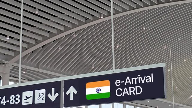 airport directional sign indicating India digital e-Arrival Card lane and Fast Track Immigration for the Trusted Traveller Program or FTI TTP - program for trusted travellers, representing modern
