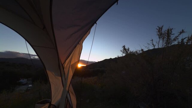 tent camping in the moutains at sunset slo motion footage no people
