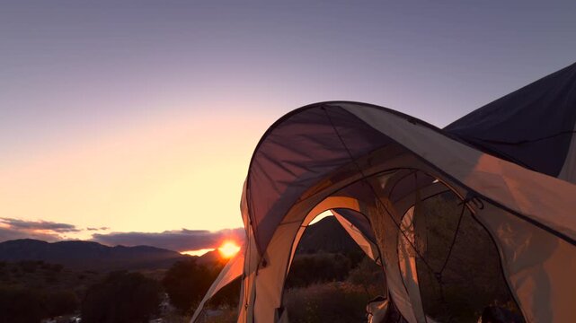 tent camping in the moutains at sunset slo motion footage no people
