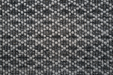 Fototapeta premium Close-up of woven gray upholstery textile