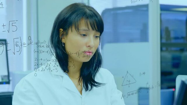 Camera revealing scientist raising vial, turning and aligning on glass, annotating to match data
