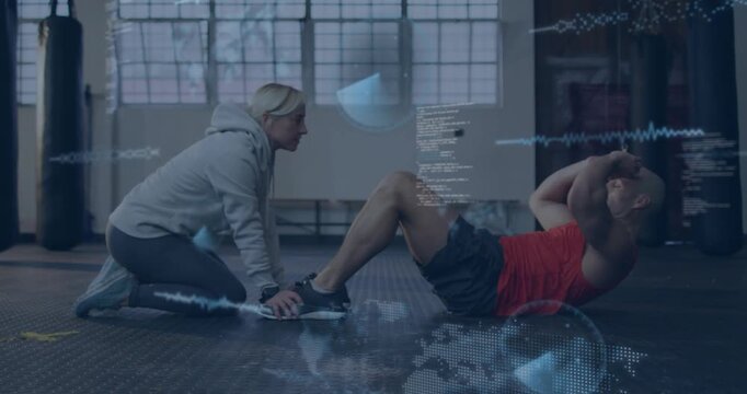 coach kneeling holding client feet, client doing ab reps as blue overlays growing showing progress