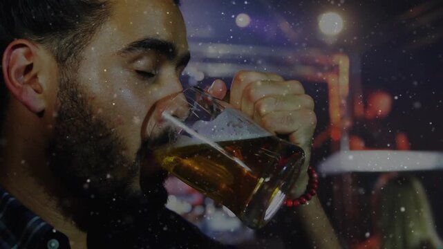 Man lifting beer mug, drinking and lowering in bar for entertainment, grain overlaying face and mug