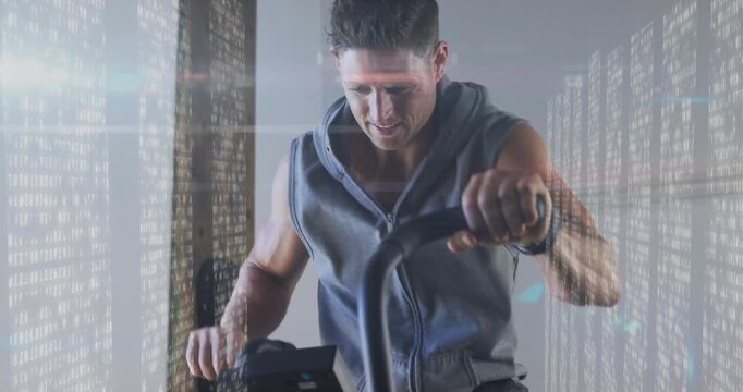 Man cycling, glancing at bike console and pressing buttons, activating fitness data overlay