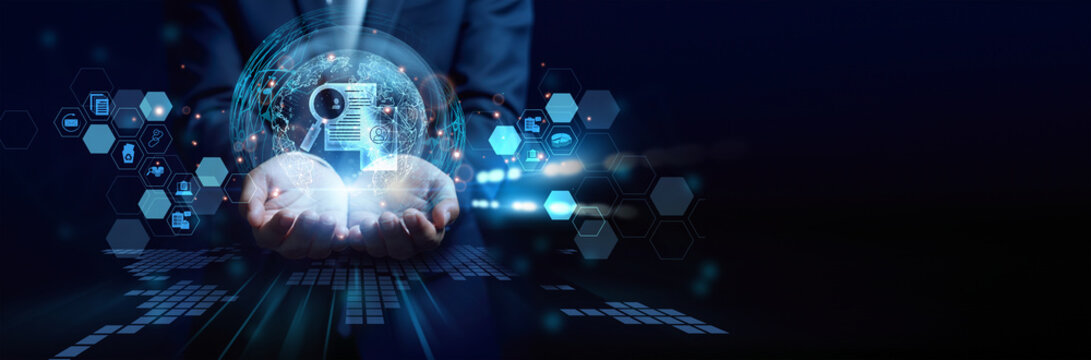 Office professional holding digital files. Document Management organizes, stores, tracks, and secures documents in digital systems.