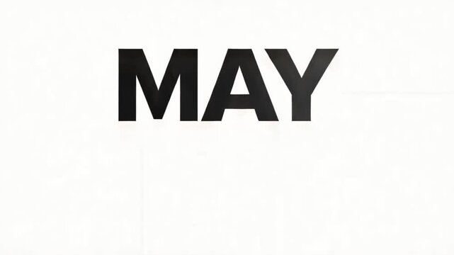 A large, gradient, gray month name on a white background