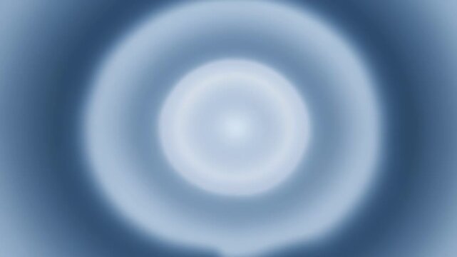Abstract blurred concentric circles in light blue and dark blue tones