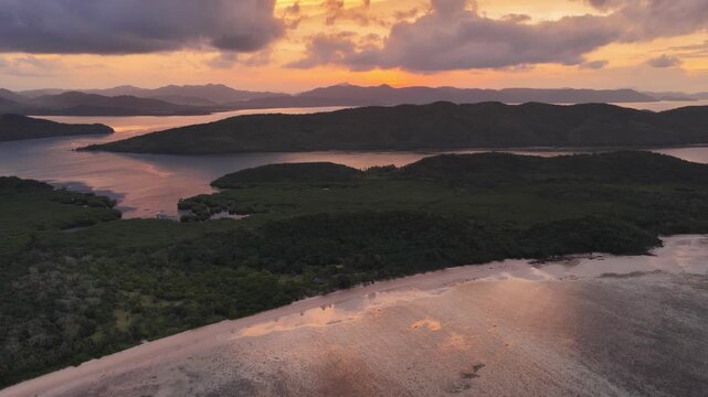 Cinematic aerial video of tropical beach in the Philippines, at sunrise. 