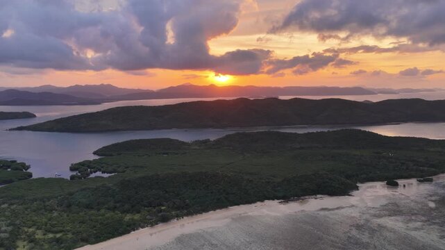 Cinematic aerial video of tropical beach in the Philippines, at sunrise. 