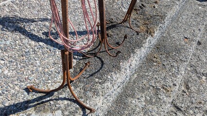Rusty Boat Anchors with Rope on Seaside Promenade Steps in Kobuleti Georgia