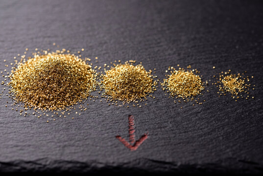Gold dust piles decreasing with red arrow showing wealth erosion