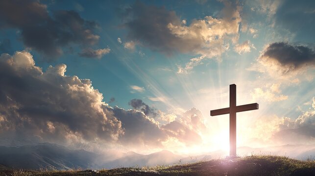 A large wooden cross stands on a grassy hill with a beautiful cloudy sky and sunset in the background.