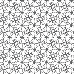 Obraz premium Elegant black and white floral pattern with intricate heart shapes, ideal for backgrounds or textile designs.
